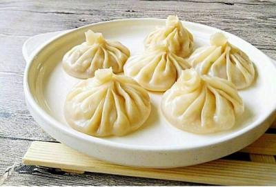 灌汤包午夜无码免费视频哪里滋味好?皮薄透亮，汤多馅饱